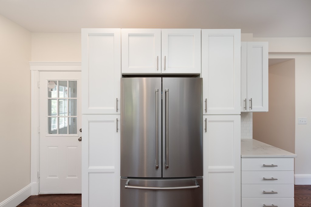 180 Magazine Street, Unit 2 Cambridge, MA 02139 - Photo 6 of 20 a view of kitchen with cabinets and refrigerator