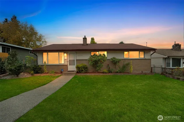 a view of a backyard of the house