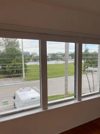 a view of a room and window