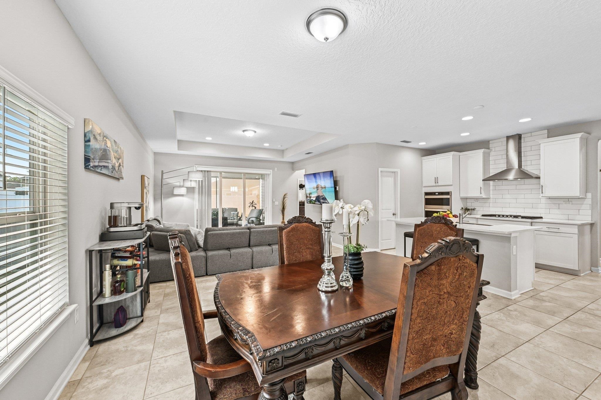 75 Pinzon Place St. Augustine, FL 32095 - Photo 10 of 51 a view of a dining room with furniture and wooden floor