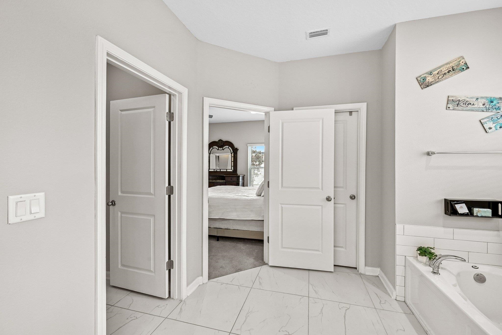 75 Pinzon Place St. Augustine, FL 32095 - Photo 21 of 51 a view of a bedroom from hallway