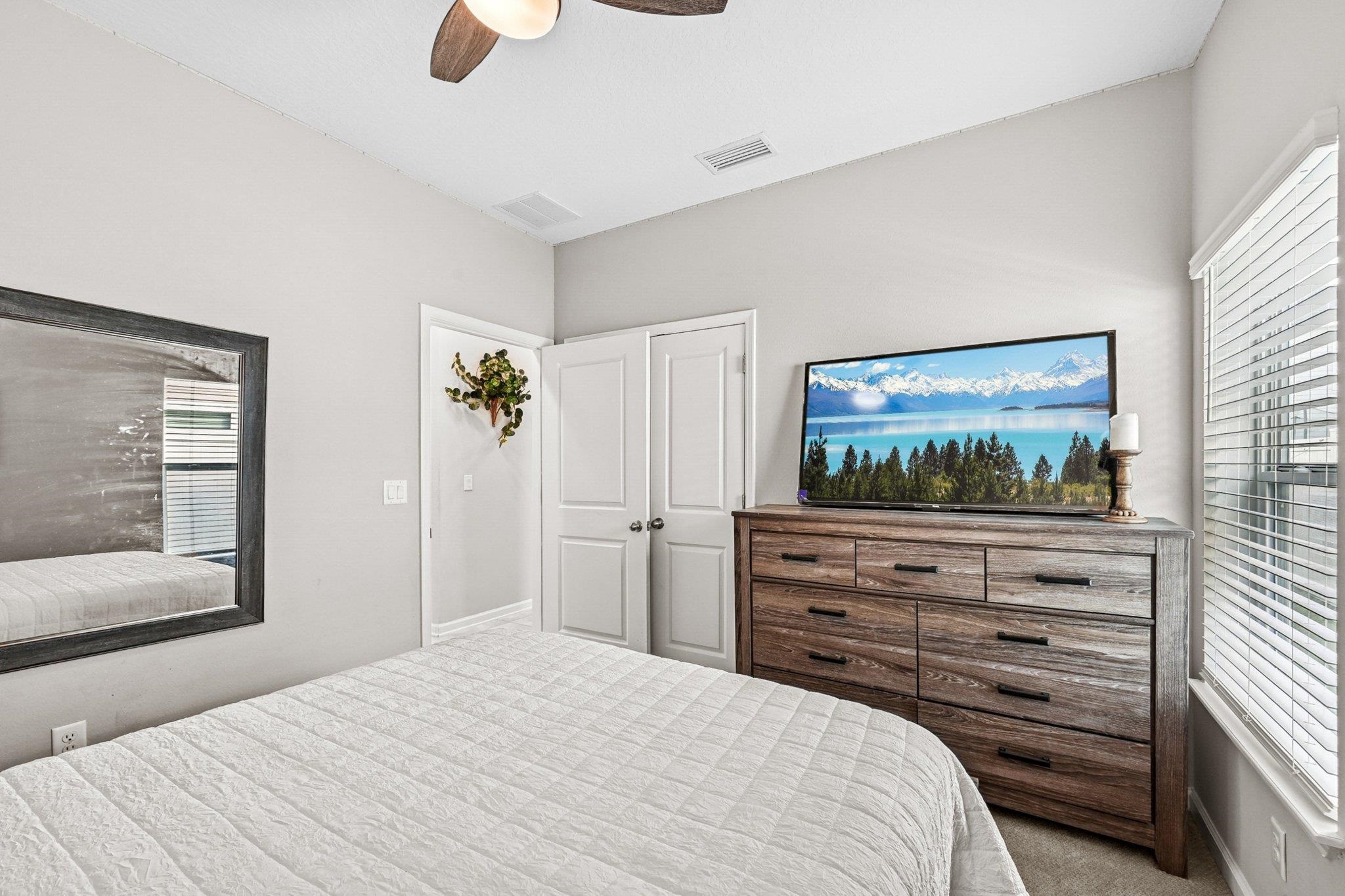 75 Pinzon Place St. Augustine, FL 32095 - Photo 29 of 51 a bedroom with a bed and a flat screen tv