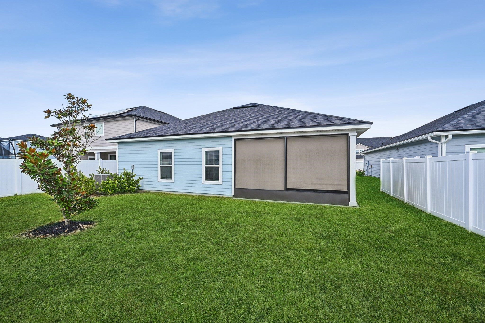75 Pinzon Place St. Augustine, FL 32095 - Photo 35 of 51 a front view of a house with garden