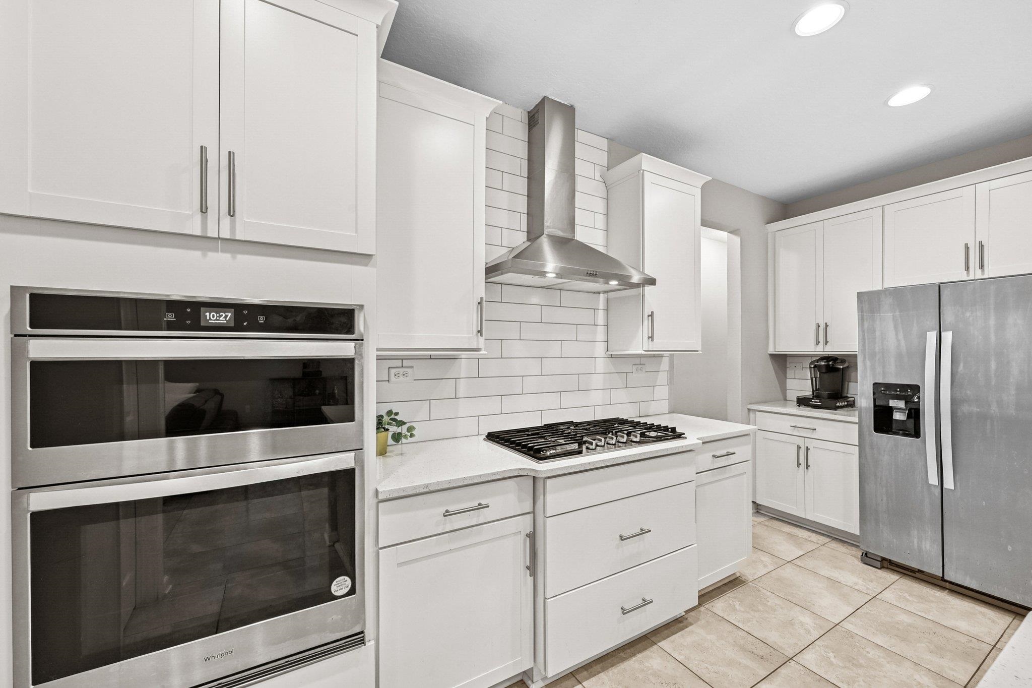 75 Pinzon Place St. Augustine, FL 32095 - Photo 5 of 51 a kitchen with cabinets stainless steel appliances and a counter space