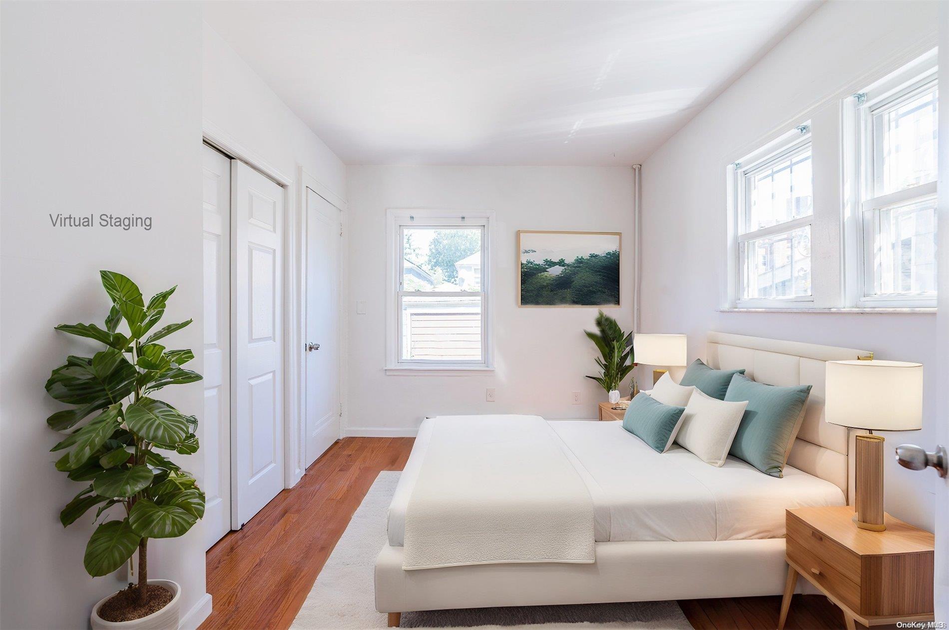 55-15 96th Street Queens, NY 11368 - Photo 12 of 31 a bedroom with a bed running cycle and a window