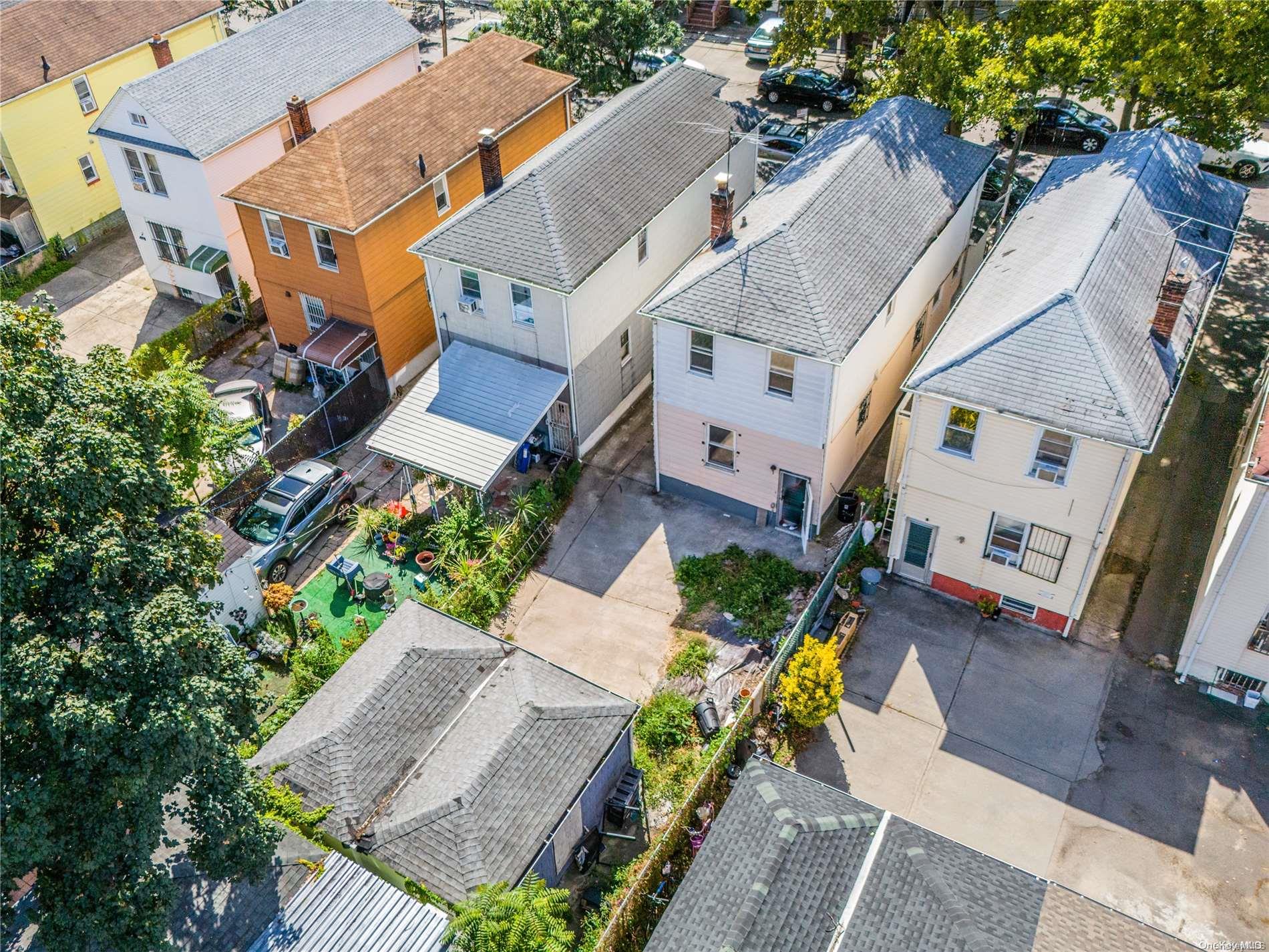 55-15 96th Street Queens, NY 11368 - Photo 3 of 31 an aerial view of a house