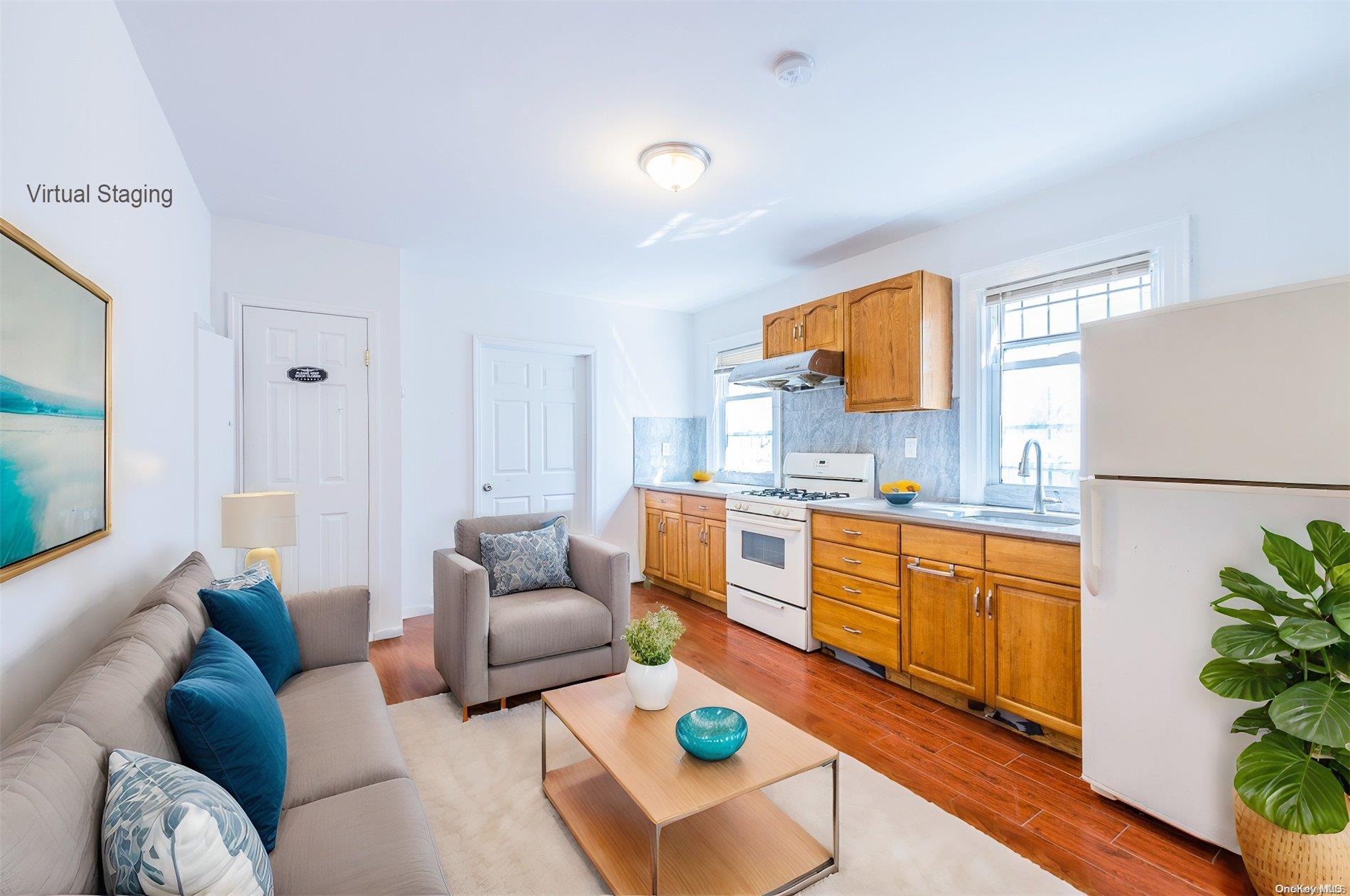 55-15 96th Street Queens, NY 11368 - Photo 8 of 31 a living room with furniture and a large window