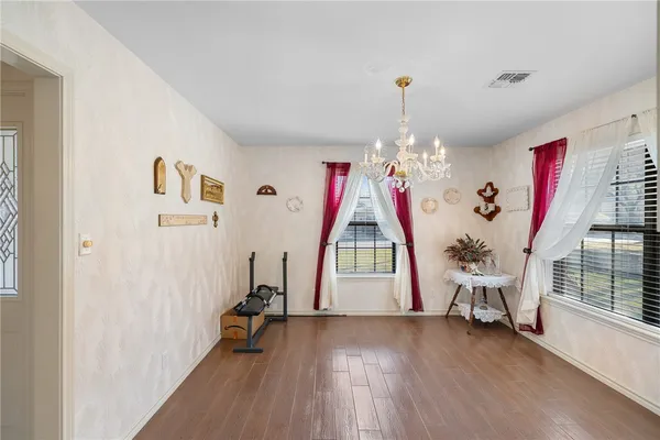 a view of entryway with wooden floor
