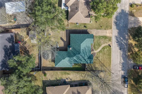 an aerial view of a town with couple of houses