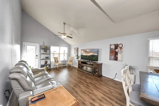 a spacious bathroom with a double vanity sink and a mirror