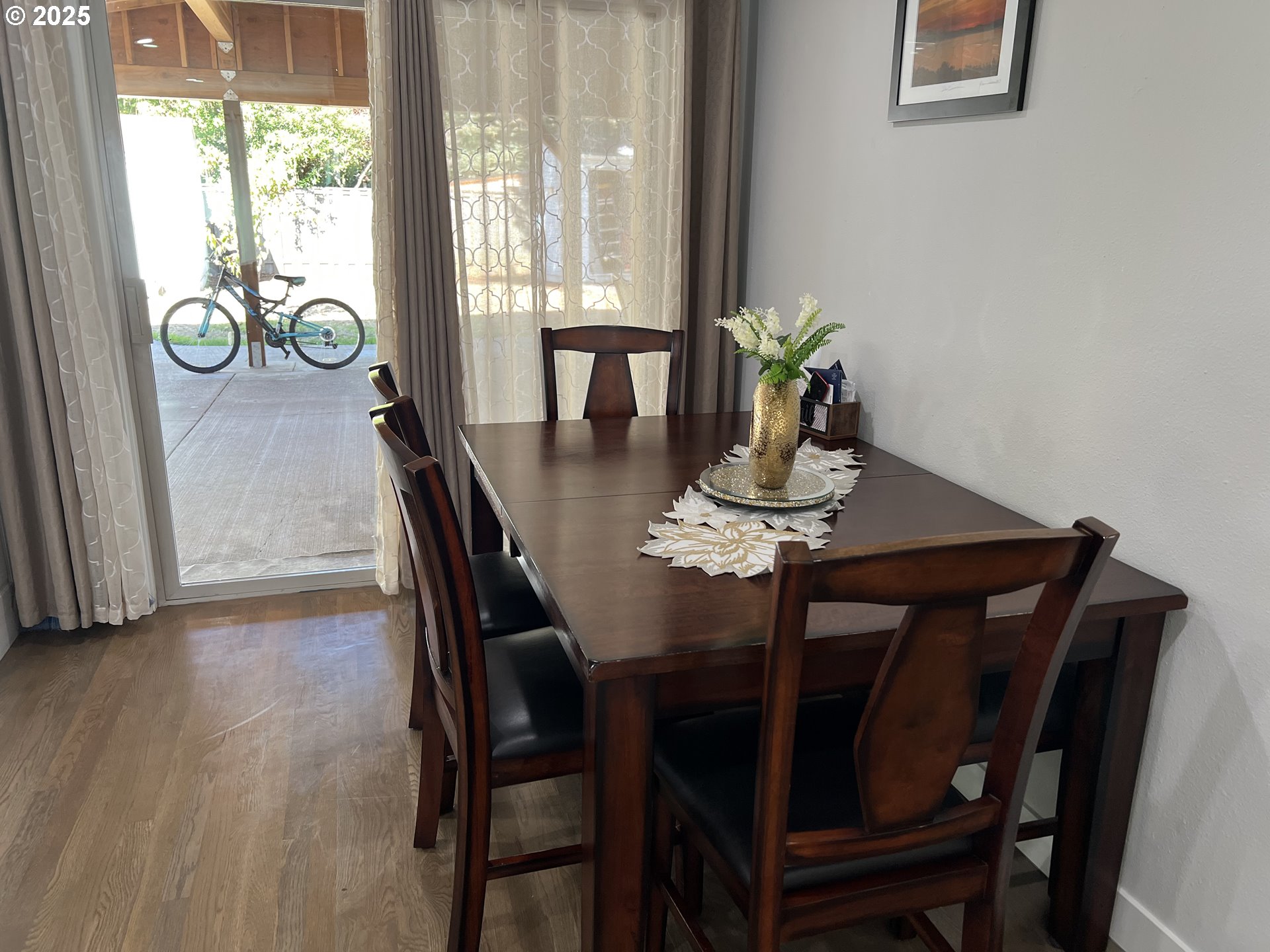 17519 Southeast Tibbetts Street Portland, OR 97236 - Photo 13 of 32 a view of a dining room with furniture window and outside view
