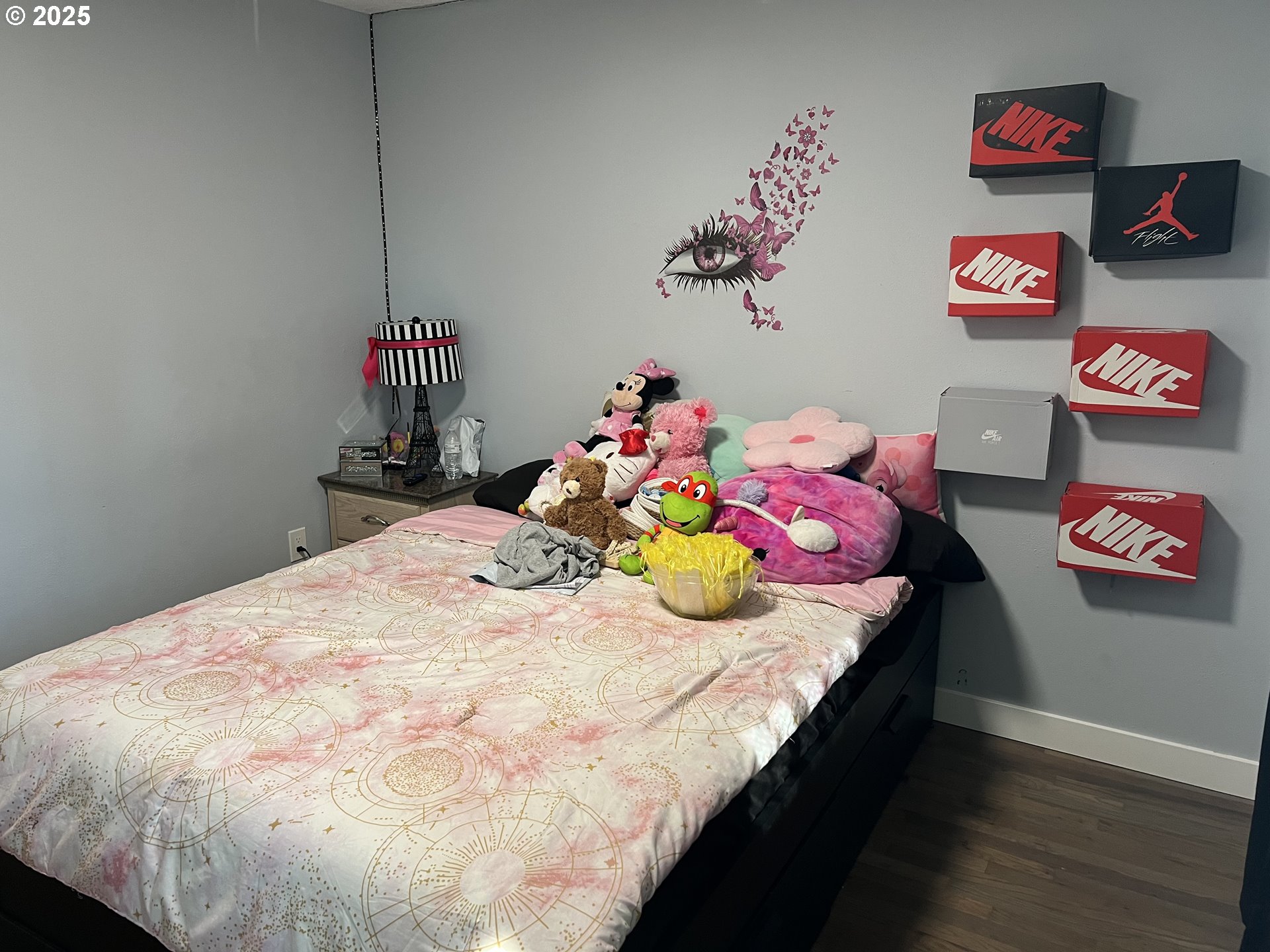 17519 Southeast Tibbetts Street Portland, OR 97236 - Photo 21 of 32 a bedroom with a bed and dresser
