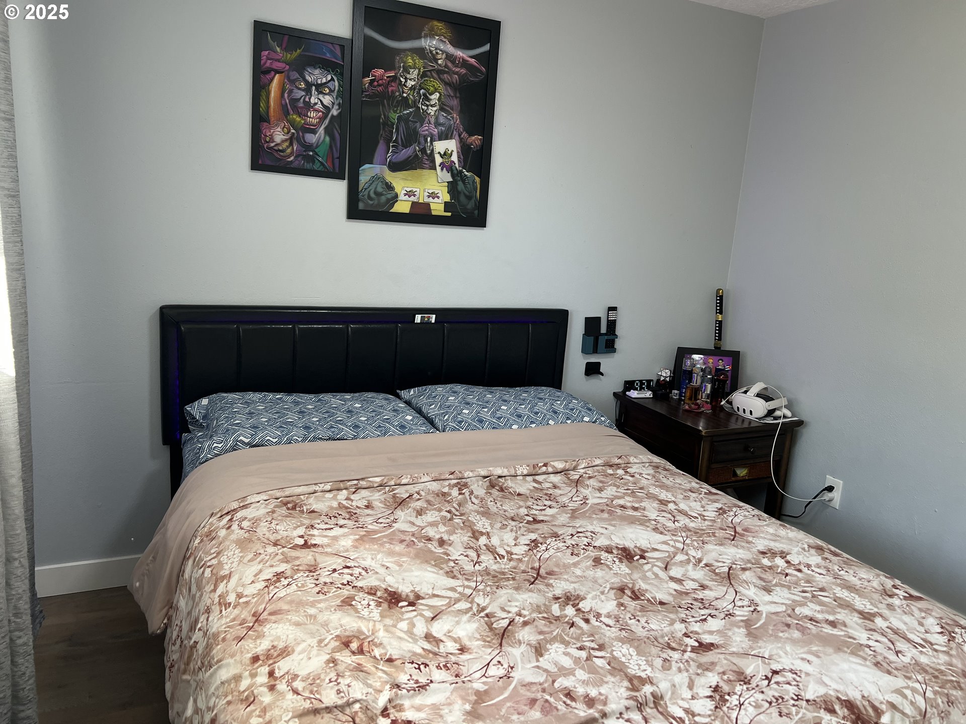 17519 Southeast Tibbetts Street Portland, OR 97236 - Photo 23 of 32 a bedroom with a bed and painting on the wall