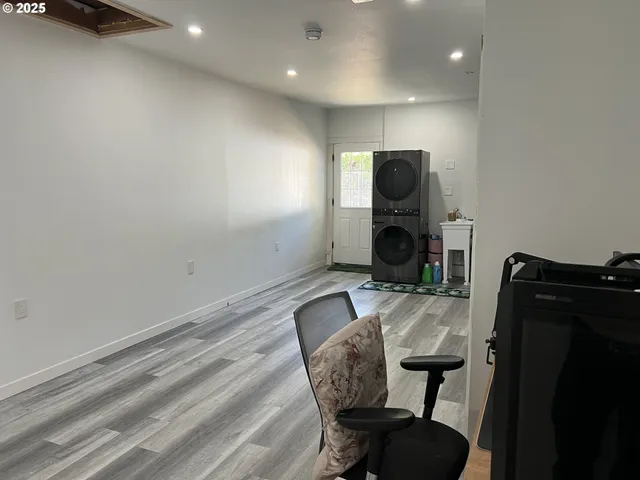 a view of a workspace with furniture