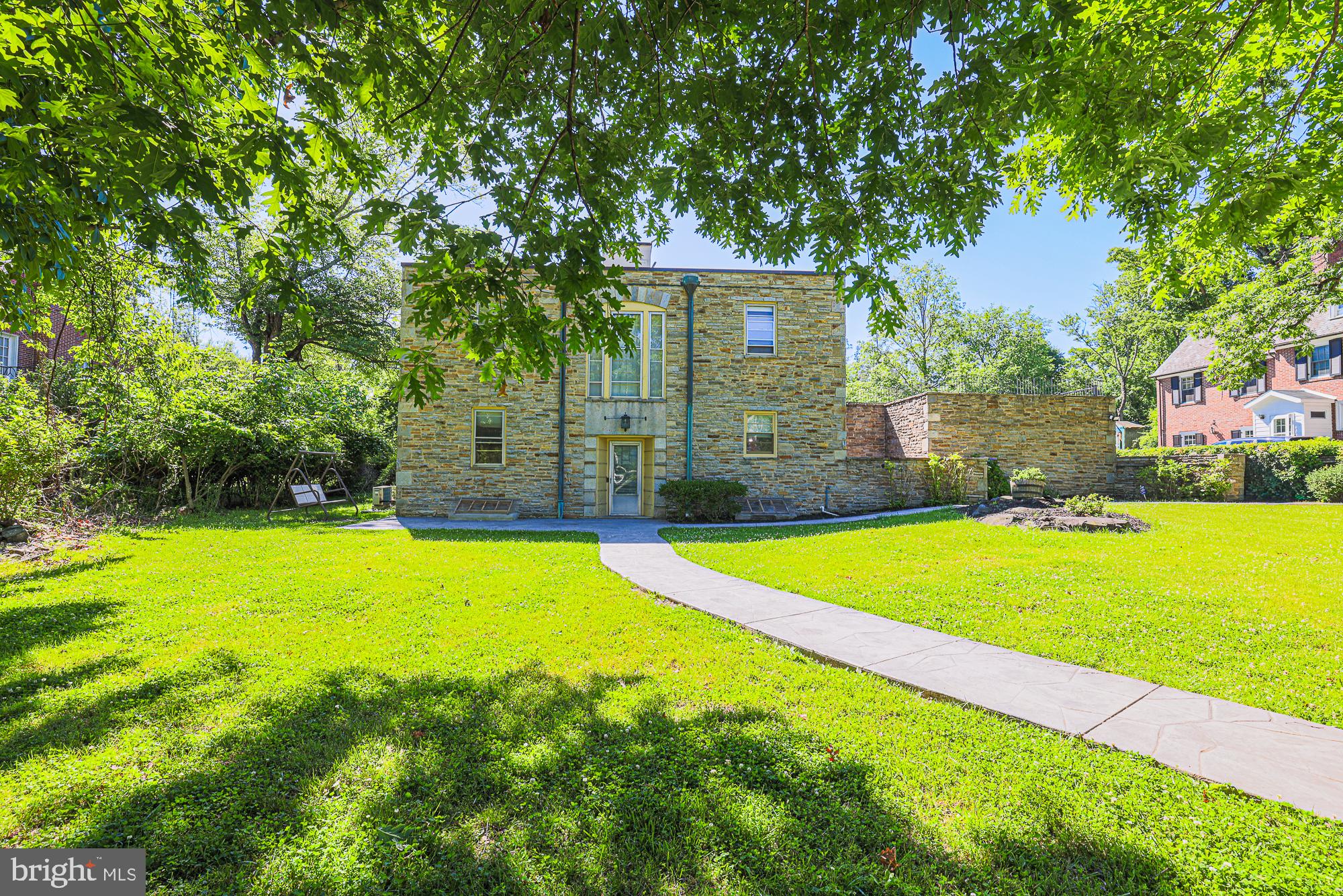 3305 Bancroft Road Baltimore, MD 21215 - Photo 3 of 61 Charming stone home in lush greenery.