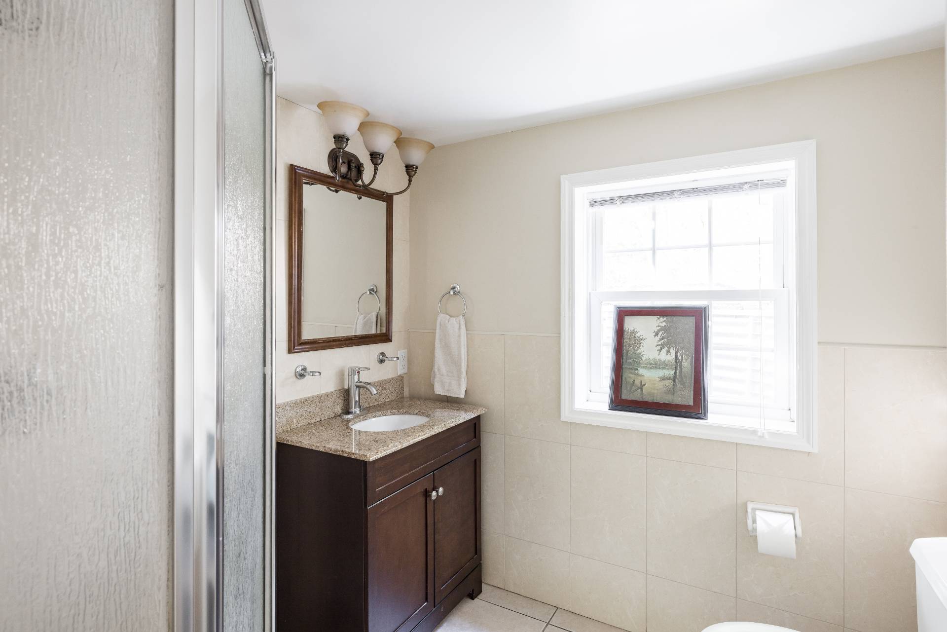 9 Ditch Plains Road Montauk, NY 11954 - Photo 11 of 14 a bathroom with a sink and a mirror