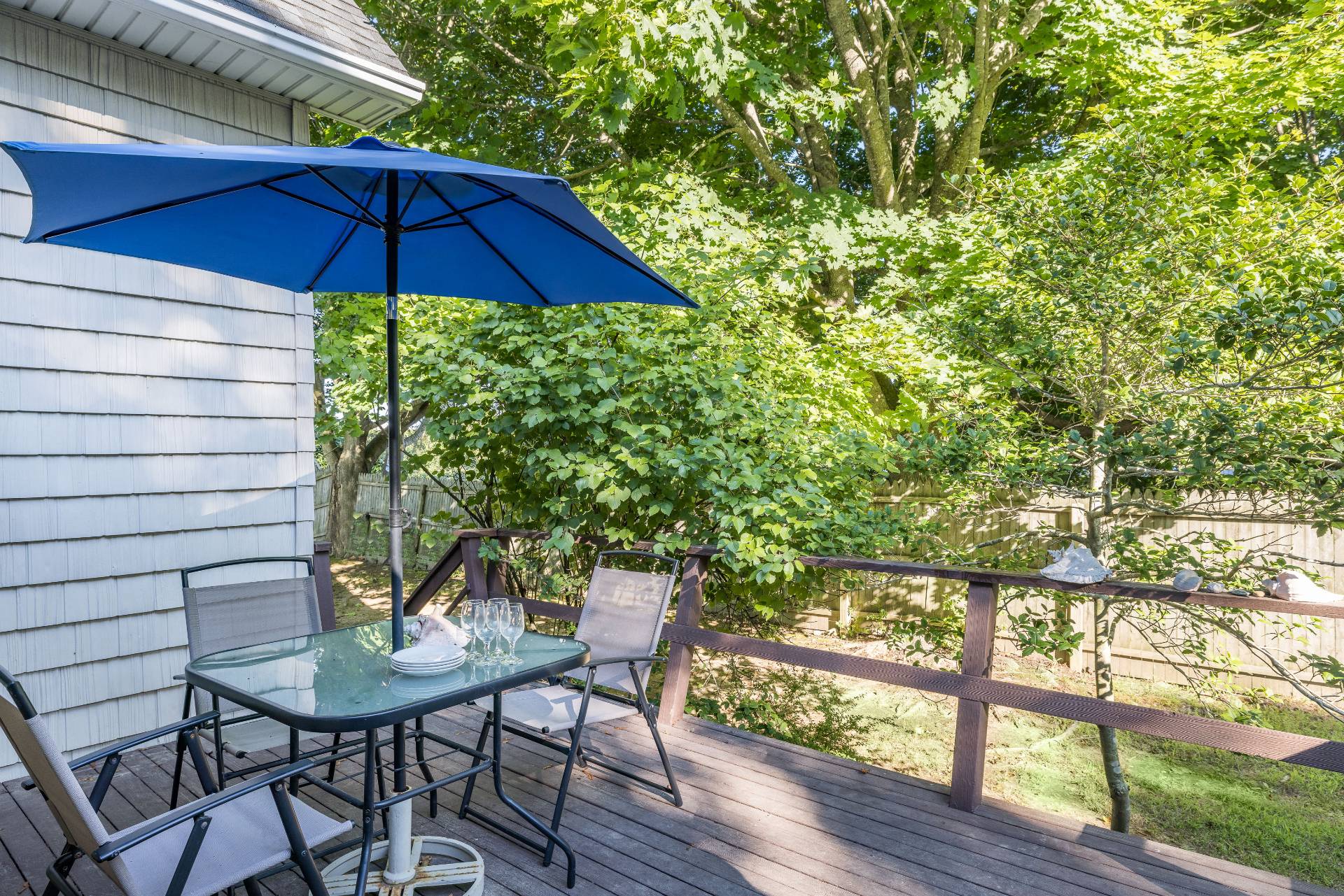 9 Ditch Plains Road Montauk, NY 11954 - Photo 13 of 14 a view of balcony with wooden floor and outdoor seating