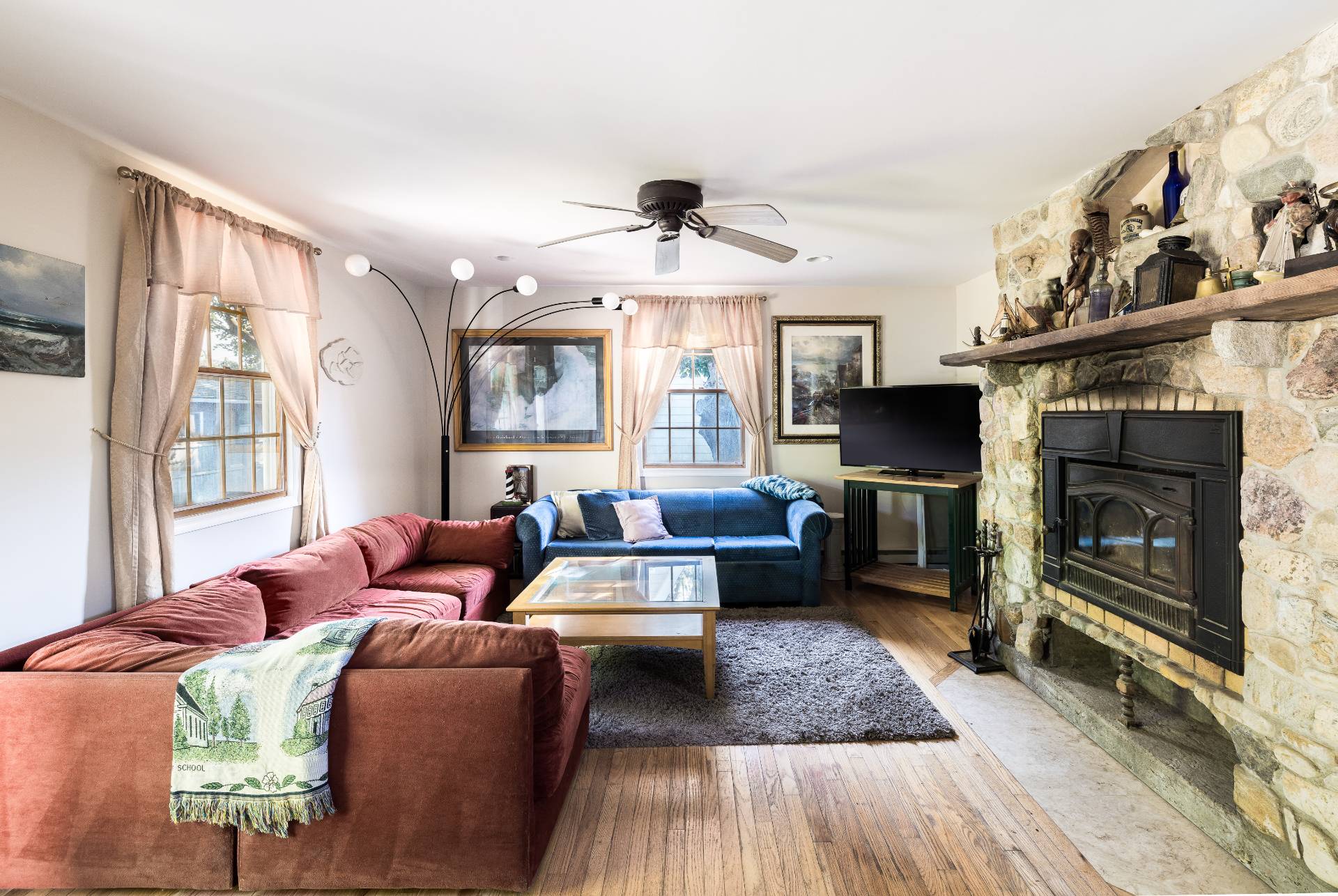 9 Ditch Plains Road Montauk, NY 11954 - Photo 6 of 14 a living room with furniture fireplace and a window