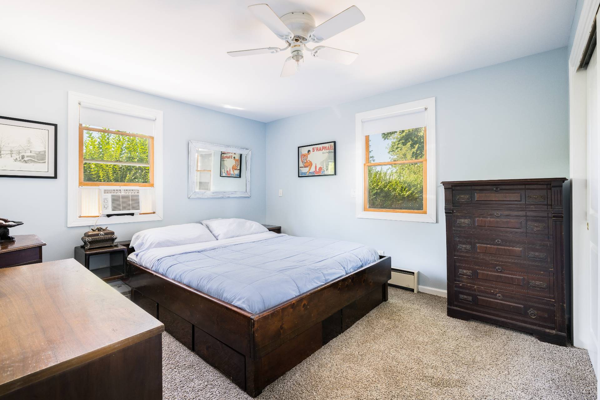 9 Ditch Plains Road Montauk, NY 11954 - Photo 7 of 14 a bedroom with a bed and a dresser