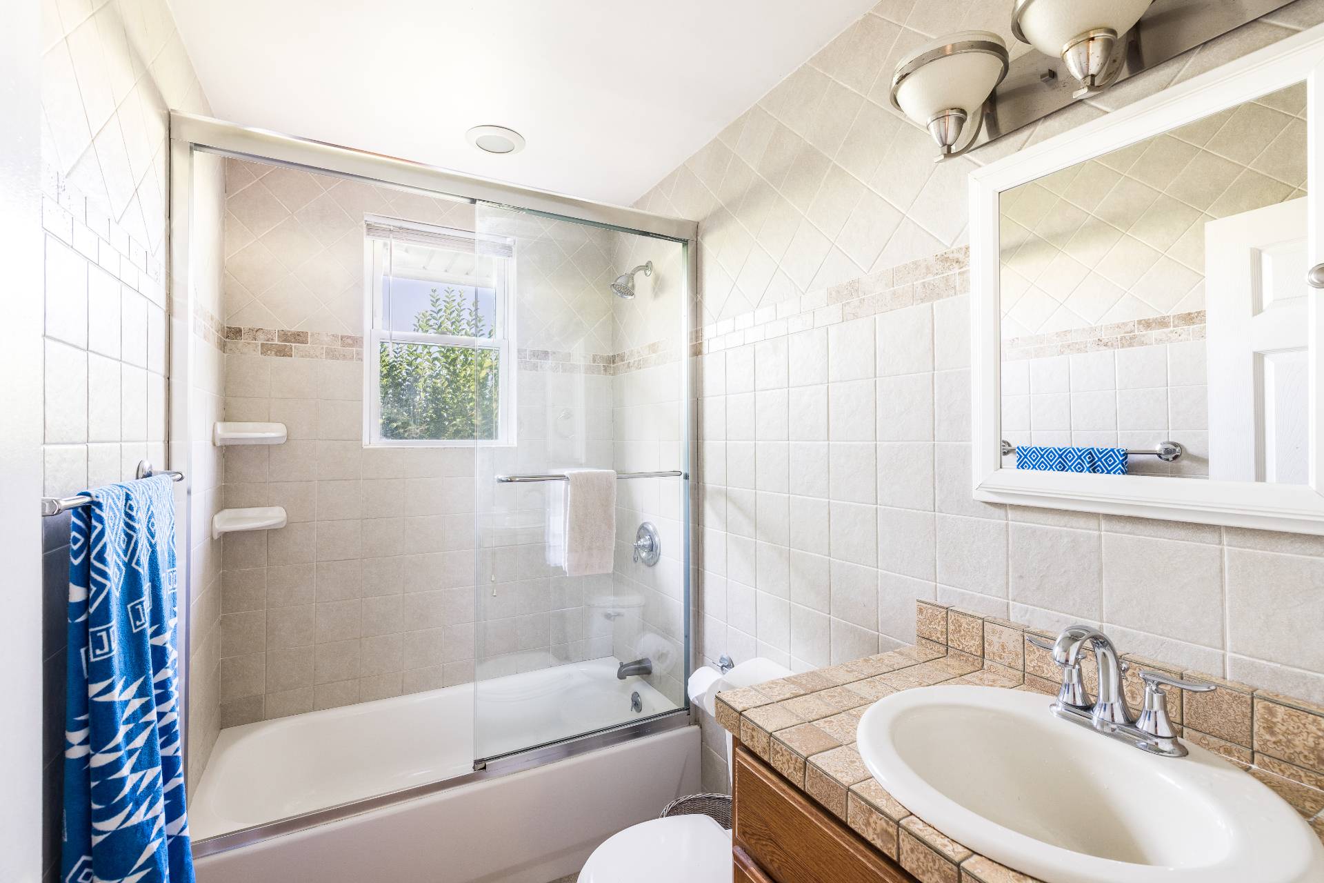9 Ditch Plains Road Montauk, NY 11954 - Photo 8 of 14 a bathroom with a granite countertop sink toilet and shower