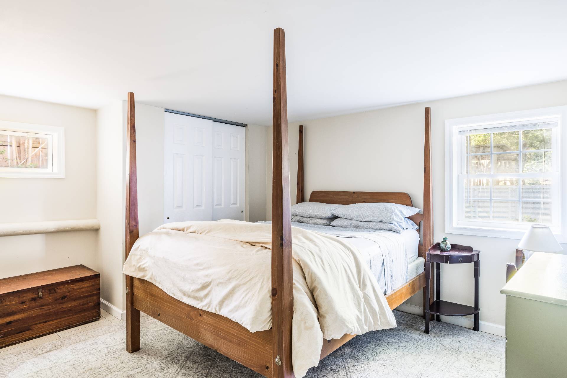 9 Ditch Plains Road Montauk, NY 11954 - Photo 9 of 14 a bedroom with a bed and a window