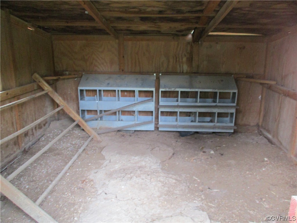 2409 Burgess Road Chester, VA 23836 - Photo 11 of 50 a view of an empty room with racks