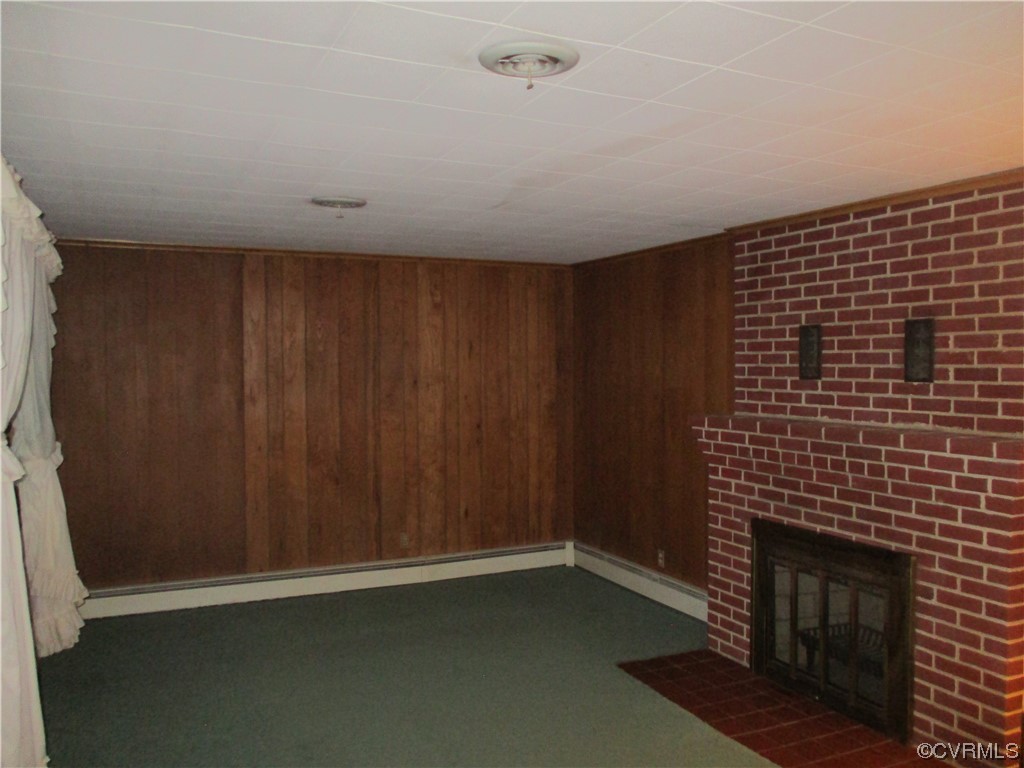 2409 Burgess Road Chester, VA 23836 - Photo 12 of 50 a view of an empty room with a fireplace