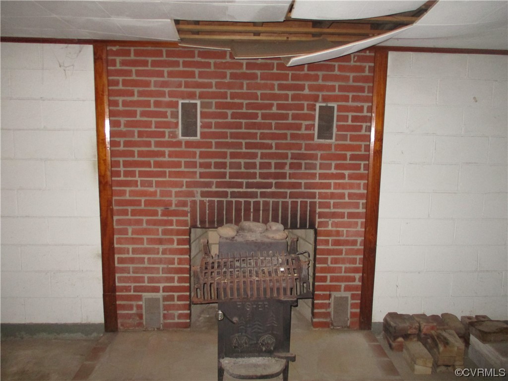 2409 Burgess Road Chester, VA 23836 - Photo 23 of 50 a brick wall with a window