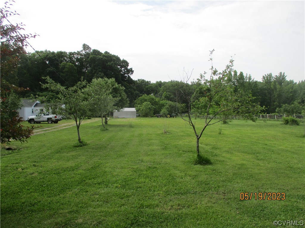 2409 Burgess Road Chester, VA 23836 - Photo 32 of 50 a view of a park with large trees