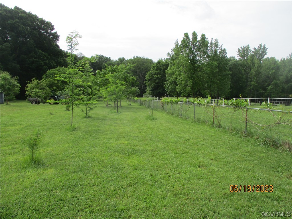 2409 Burgess Road Chester, VA 23836 - Photo 36 of 50 a view of grassy field with trees