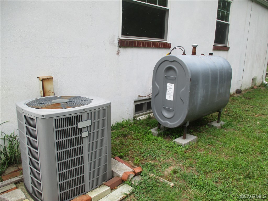 2409 Burgess Road Chester, VA 23836 - Photo 5 of 50 a view of a bathroom with sink and mirror