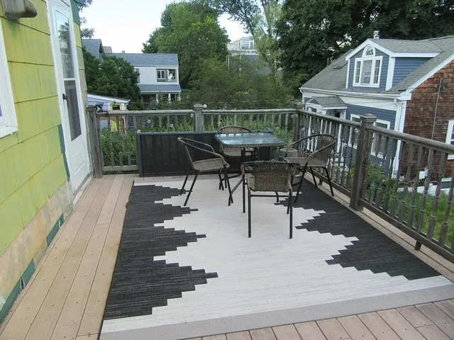 a view of balcony with furniture
