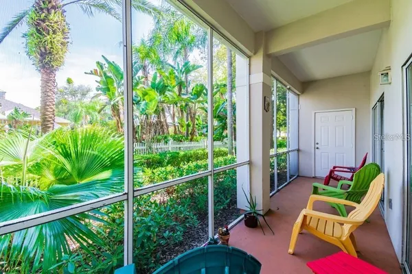 a view of a two chairs in the porch