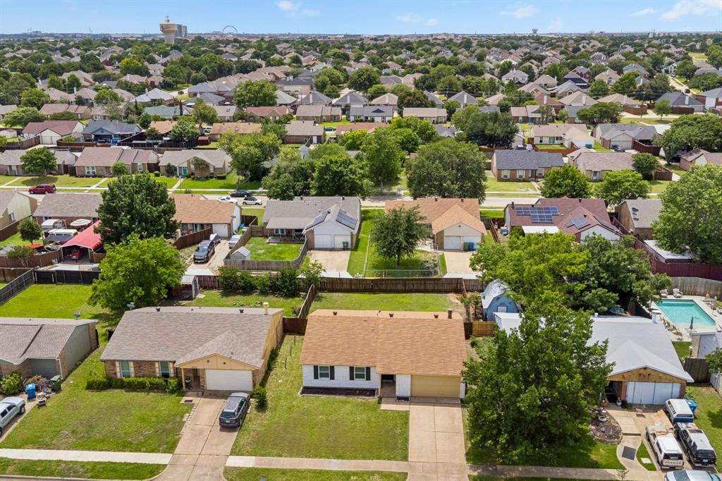 5620 Perrin Street The Colony, TX 75056 - Photo 26 of 31 an aerial view of a house with a garden