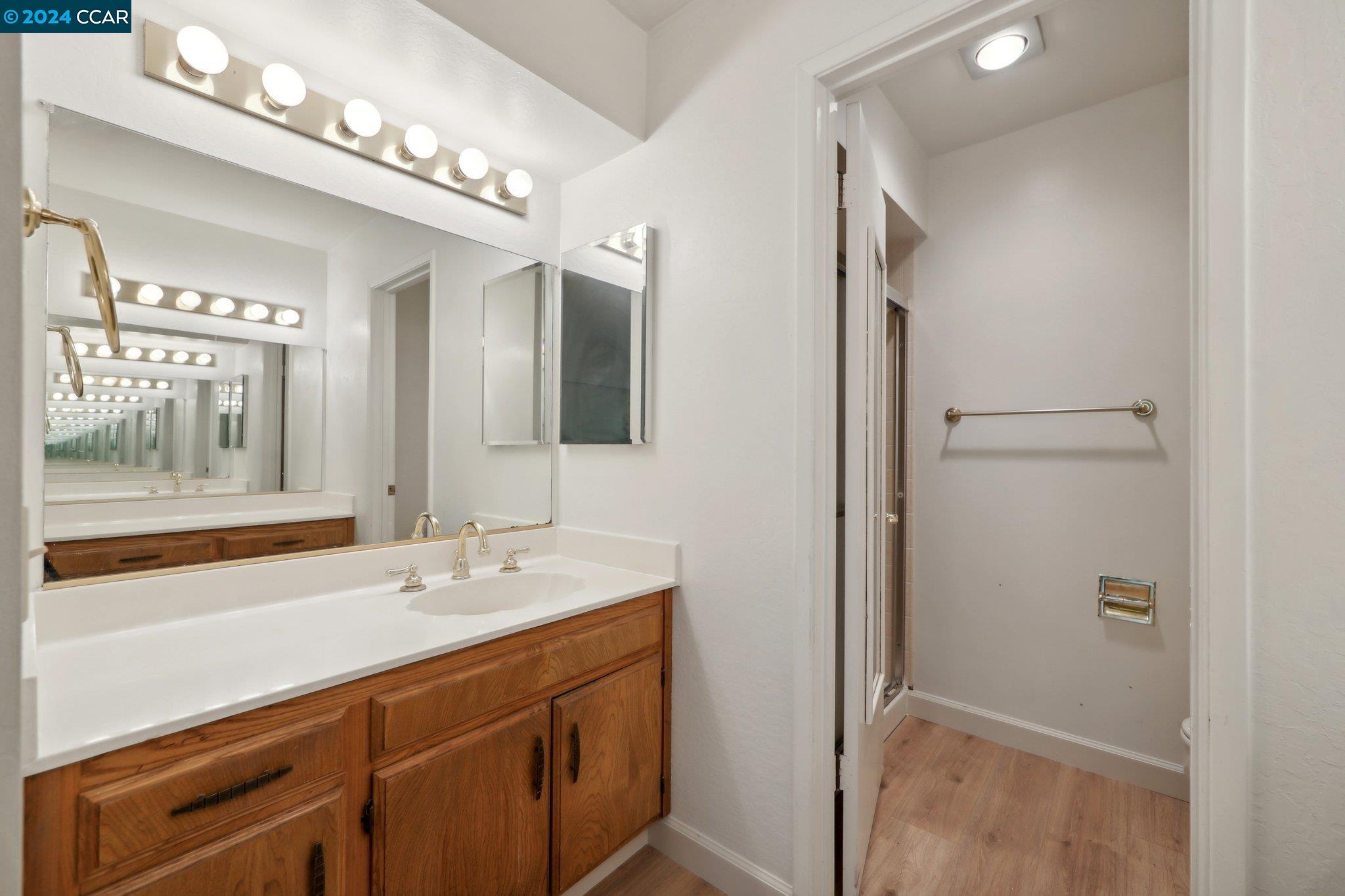 826 Augusta Drive Moraga, CA 94556 - Photo 21 of 35 a bathroom with a sink double vanity and a mirror