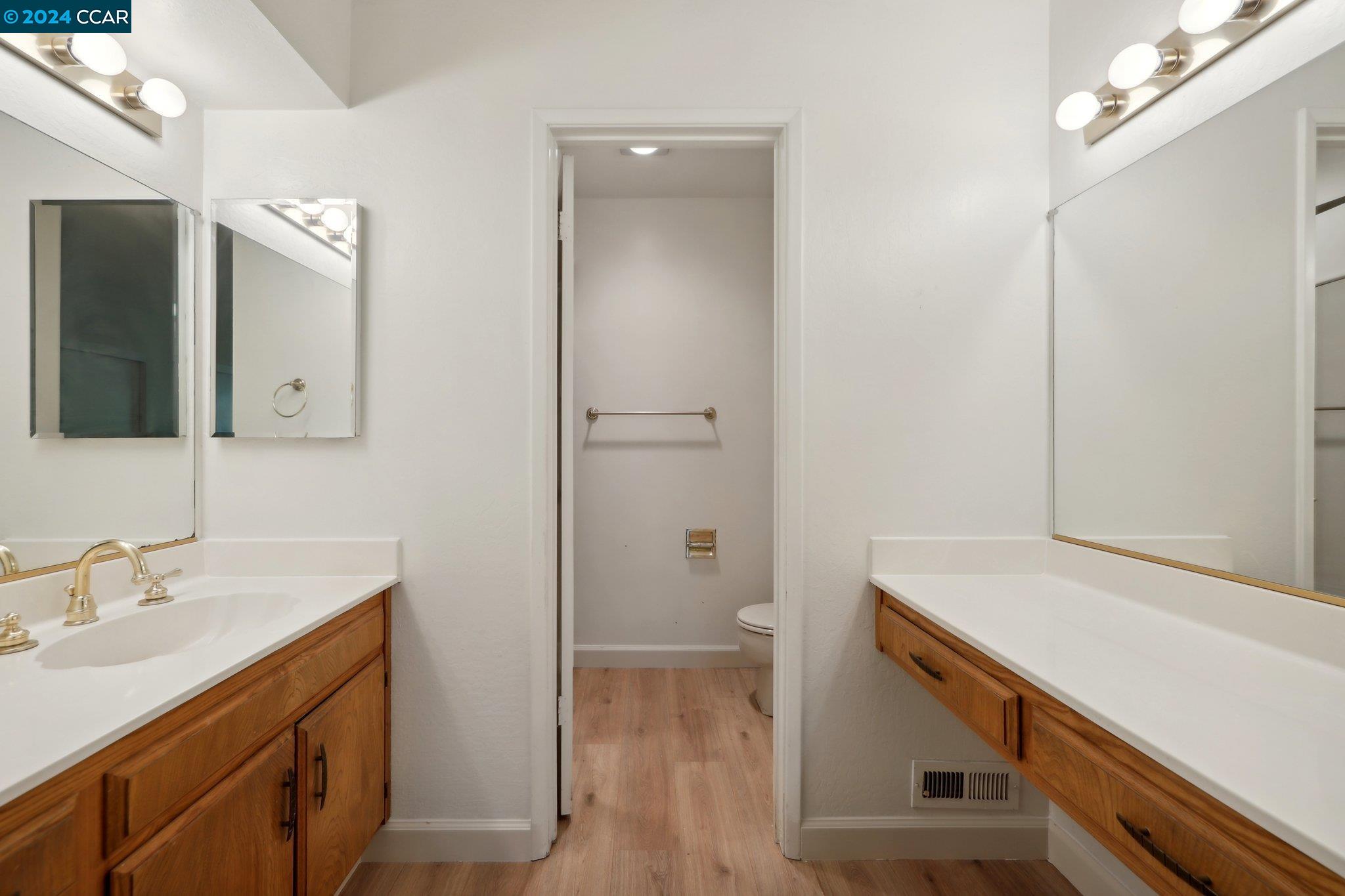 826 Augusta Drive Moraga, CA 94556 - Photo 22 of 35 a bathroom with a sink a toilet and shower