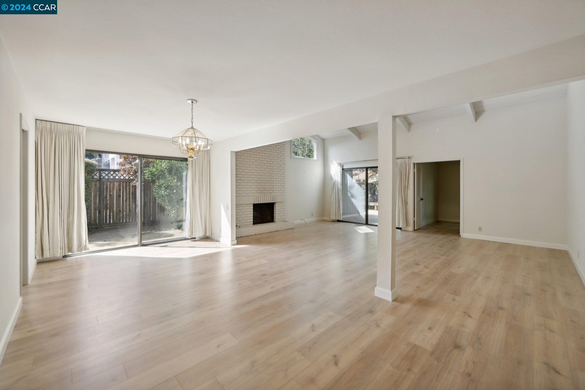 826 Augusta Drive Moraga, CA 94556 - Photo 4 of 35 a view of a livingroom with wooden floor and a window