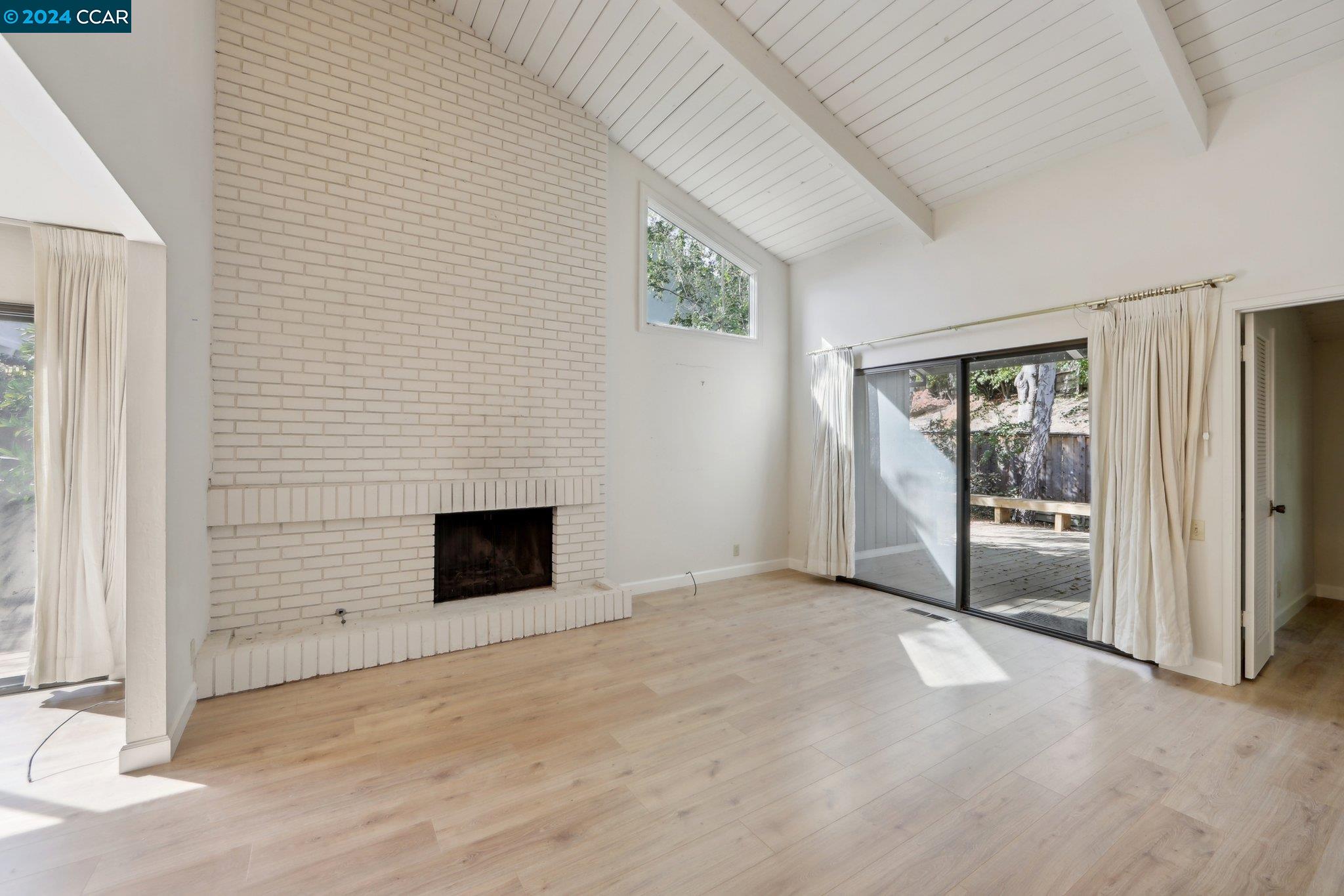 826 Augusta Drive Moraga, CA 94556 - Photo 6 of 35 a view of a livingroom with an empty space and a fireplace