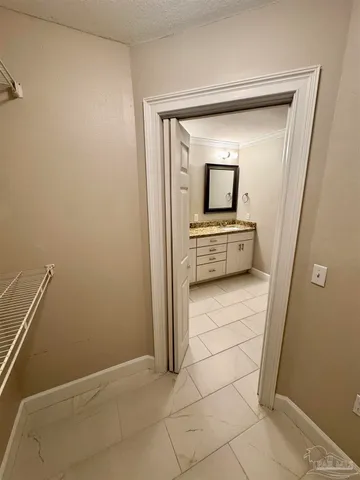 a bathroom with a sink and mirror