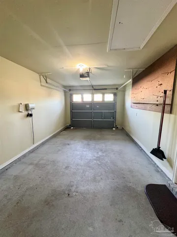 a view of a room with a fireplace