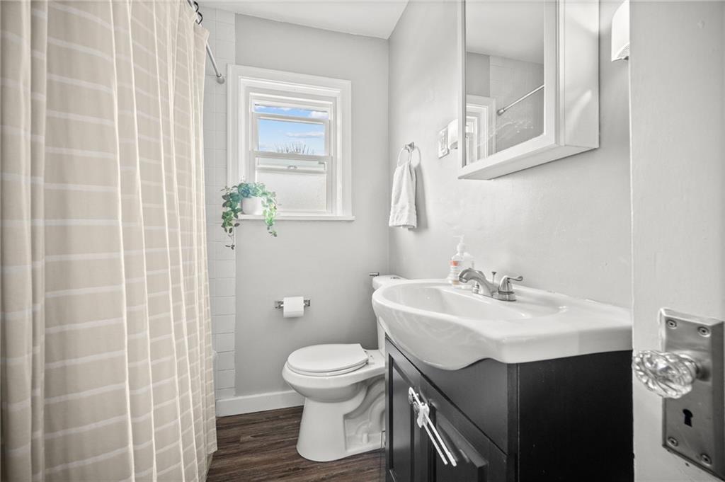 416 Phillips Avenue McKees Rocks, PA 15136 - Photo 19 of 46 a bathroom with a sink toilet and shower