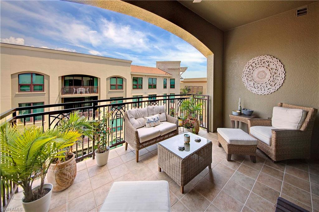 9115 Strada Place, Unit 5501 Naples, FL 34108 - Photo 1 of 31 a living room with furniture