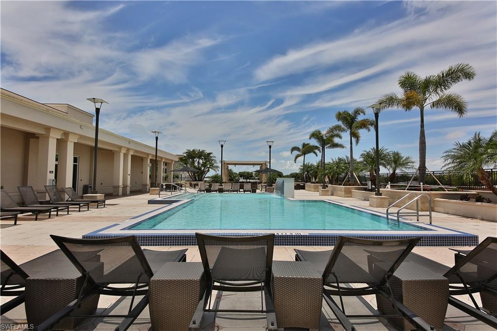 9115 Strada Place, Unit 5501 Naples, FL 34108 - Photo 22 of 31 a view of a backyard and swimming pool