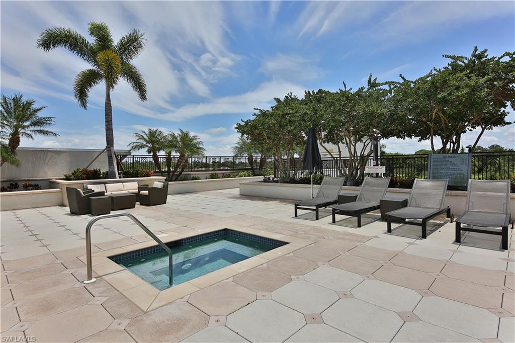 9115 Strada Place, Unit 5501 Naples, FL 34108 - Photo 30 of 31 a view of outdoor space with seating