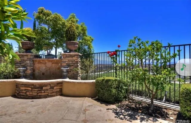 a view of a livingroom with furniture and a potted plant