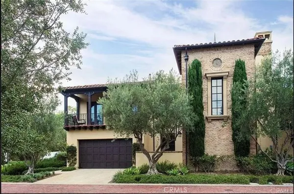 front view of a house with a trees