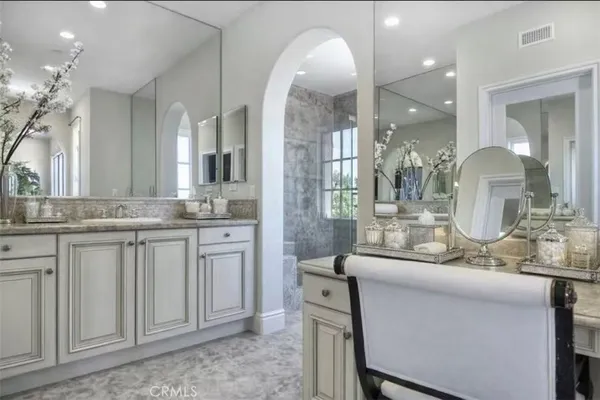 a white bath tub sitting next to a window