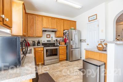 923 Azurine Circle Fort Mill, SC 29708 - Photo 12 of 32 a kitchen with a refrigerator sink and stove