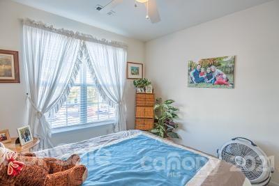 923 Azurine Circle Fort Mill, SC 29708 - Photo 14 of 32 a bedroom with a bed and a window