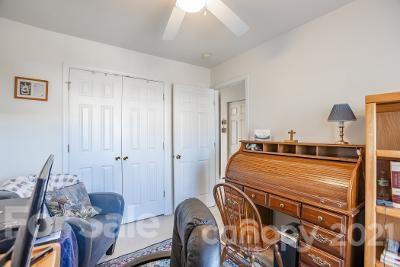923 Azurine Circle Fort Mill, SC 29708 - Photo 28 of 32 a room with a bed and furniture
